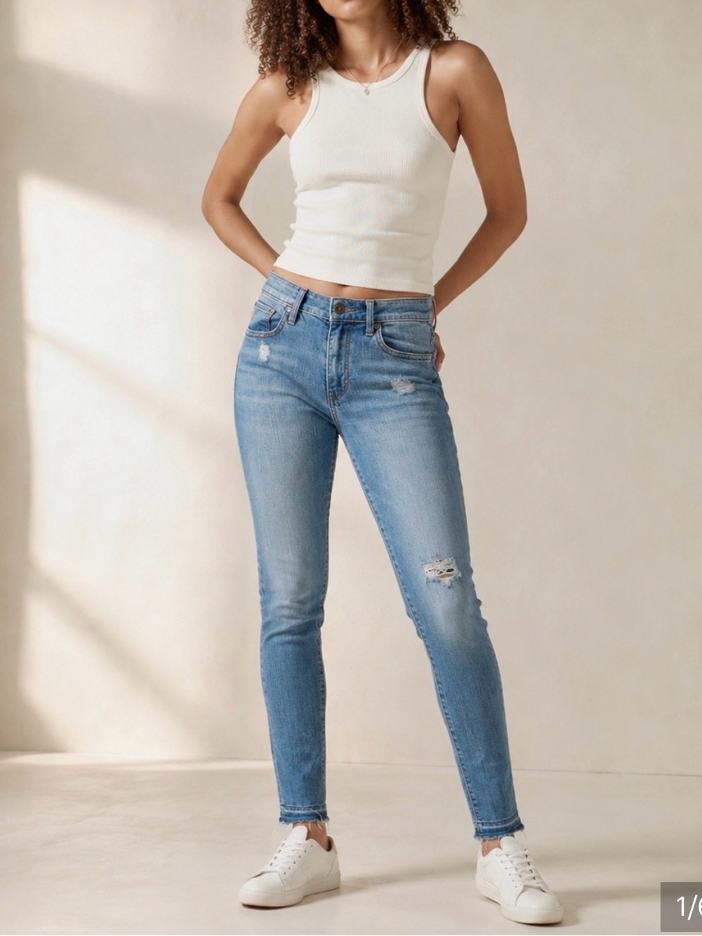 Levi’s 721 Light Blue Distressed High-Rise Skinny Jeans